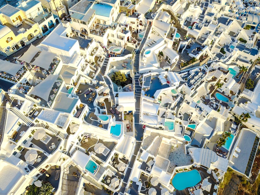 Santorini Villas With Caldera Windows and Dome Pools